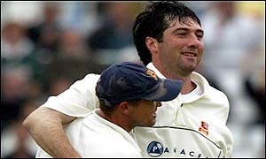 Irani is congratulated by Andy Flower after dismissing Anurag Singh