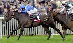 Kazzia, ridden by Frankie Dettori, wins the Oaks