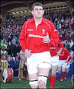 Michael Owen runs on to the ground to become the 1000th player capped by Wales