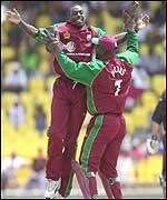 Pedro Collins celebrates with Ridley Jacobs