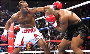 Lennox Lewis swings at Mike Tyson 
