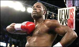 Lennox Lewis celebrates his victory over Mike Tyson