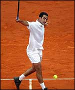 Costa hits a graceful backhand winner