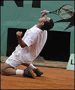 Costa falls to his knees after the winning point
