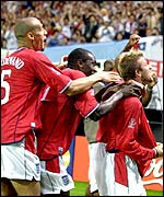 England celebrate their win against Argentina