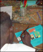 An artist at the amputee camp 