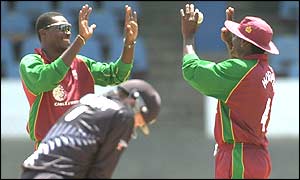 West Indies all-rounder Chris Gayle celebrates dismissing Lou Vincent