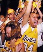 Fans of the LA Lakers celebrate their 'three-peat'