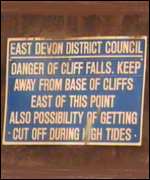 A warning sign at Salcombe Hill cliff near Sidmouth.