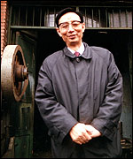 Mr Yin outside his first industrial plant