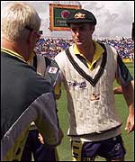 Katihc is congratulated by his teammates before his Test debut