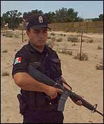 An officer on patrol on the Mexican border