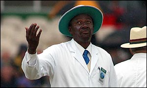 Bucknor holds his hands to the sky