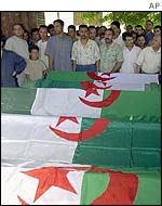 Coffins of those killed in Wednesday's machine-gun attack in Medea