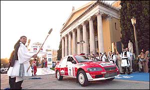Francois Delecour of France drives his Mitsubishi Lancer as the Acropolis rally gets underway