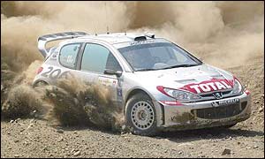 Richard Burns of Great Britain drives his Peugeot 206 during the second stage of the Acropolis Rally