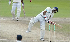 Hashan Tillakaratne of Sri Lanka dodges a wild ball 