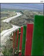 Posts mark line of security fence