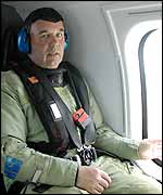 Dave Buckland in helicopter