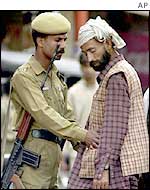 Policeman searches Kashmiri man in Rajouri