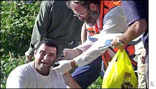 Medic tends to man at the scene 