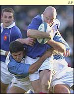 Gerald Merceron struggles to break through the Argentina defence