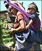 Villager in western Nepal with child