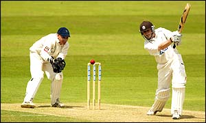 Surrey opener Ali Brown smashes the ball to the boundary