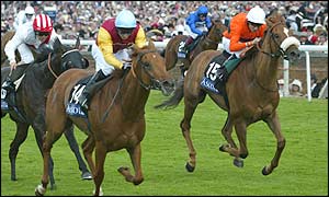 Jimmy Fortune and Norton (yellow sleeves) land the Royal Hunt Cup