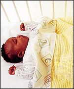 A baby in cot