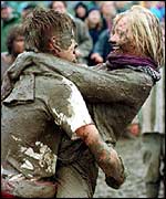 Revellers in the mud at Glastonbury 1997