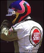 Jacques Villeneuve trudges off after being forced to retire at the Canadian Grand Prix