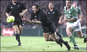 All Blacks full-back Leon MacDonald scores two tries against Ireland