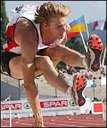 Long jumper Chris Tomlinson on his way to victory in the long jump