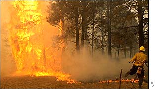 Firefighter flees flames