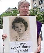 A protester against priest sex abuse