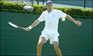 Wild card Mark Philippoussis overcame a second-set blip to record a four set victory over Julien Boutter 