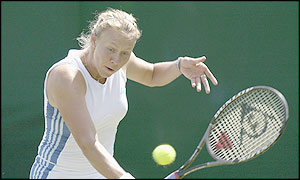 Alicia Molik backhands a powerful ball back to her opponent