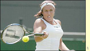 Jennifer Capriati forehands a ball which her opponent can't handle
