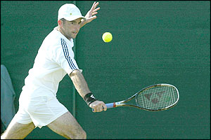 British tennis hopeful Jamie Delgado in action against number 22 seed Nicolas Lapentti