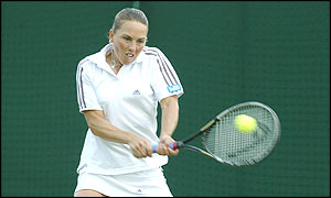 British tennis player Lucie Ahl in action against American Meghann Shaughessy