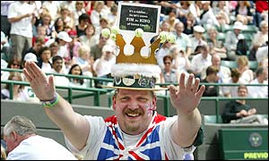 A fan cheers on Britain's Tim Henman