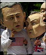 Protesters wore heads of world leaders