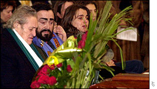 Pavarotti with his brother Ferdinando (left) at their mother's funeral in January 
