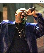 R Kelly sings 