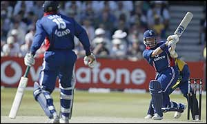 Alec Stewart lashes out for a four on the way to his fifty