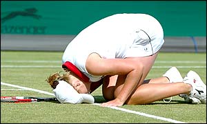 Baltacha beats the South African to the delight of the crowd and kneels on the grass courts of SW19 with relief