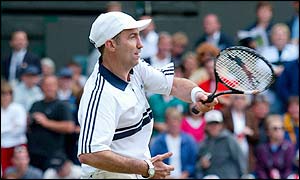 Karl Power returns a shot to his friend on Centre Court