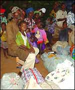 Families fleeing with few possessions