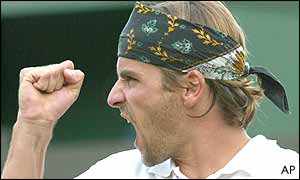 Arnaud Clement easily beats Olivier Rochus in straight sets